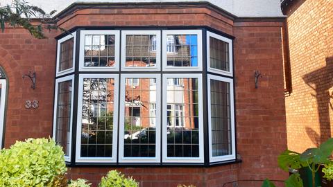 Ground floor timber leaded bay window