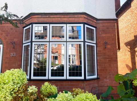 Ground floor timber leaded bay window