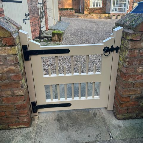 Neutral timber garden gate