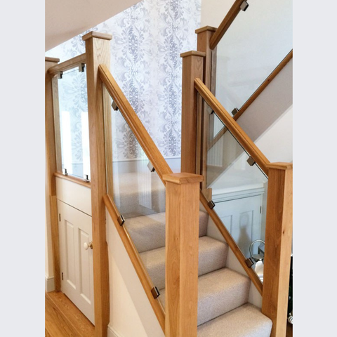 FA north timber staircase with side glasses with white and brown wooden covers