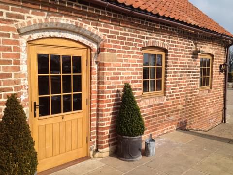Wooden barn door and windows