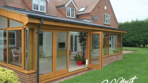 Timber french doors and conservatory